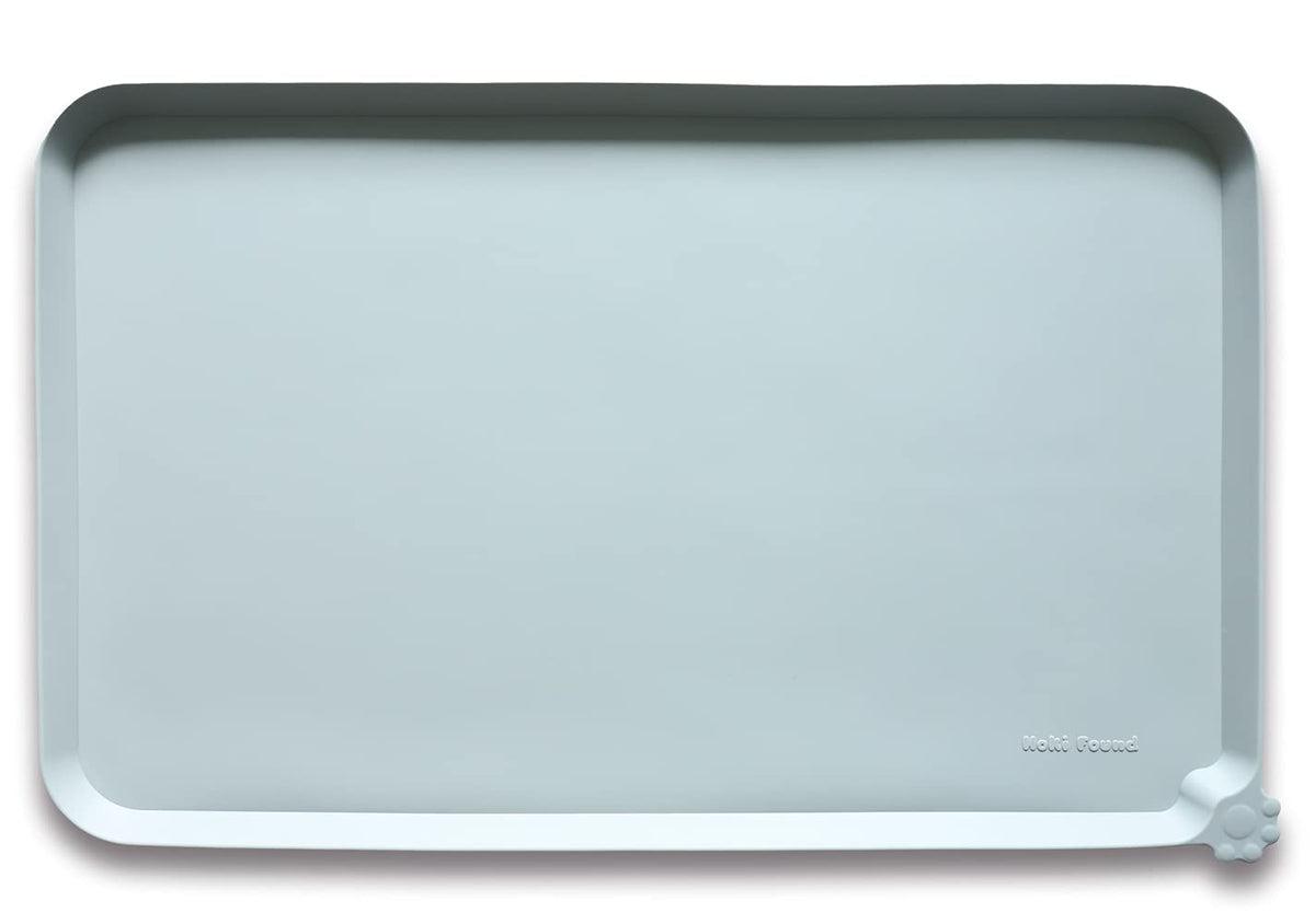 Tapis alimentaire en silicone Hoki Found, design navire de guerre, protège le sol des déversements.