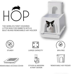 Litière HOP pour lapin avec nourrisseur-paille amovible et accès facile.