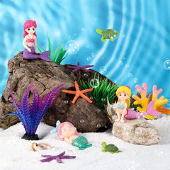 Sirènes Jetec au fond de l'aquarium, décor charmant et paisible.