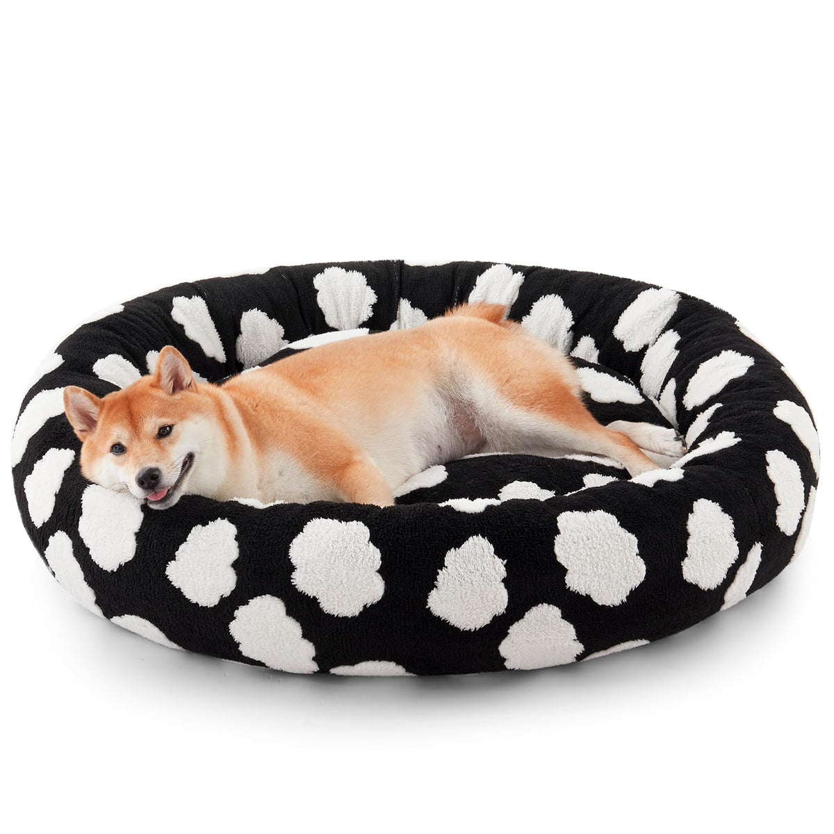 JOEJOY lit chien rond doux offre un cocon réconfortant pour les siestes quotidiennes.