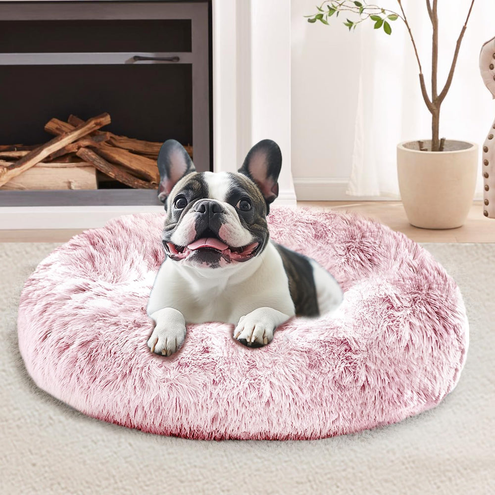 Lit donut JOLLYVOGUE pour petit chien, cocon réconfortant et rose.