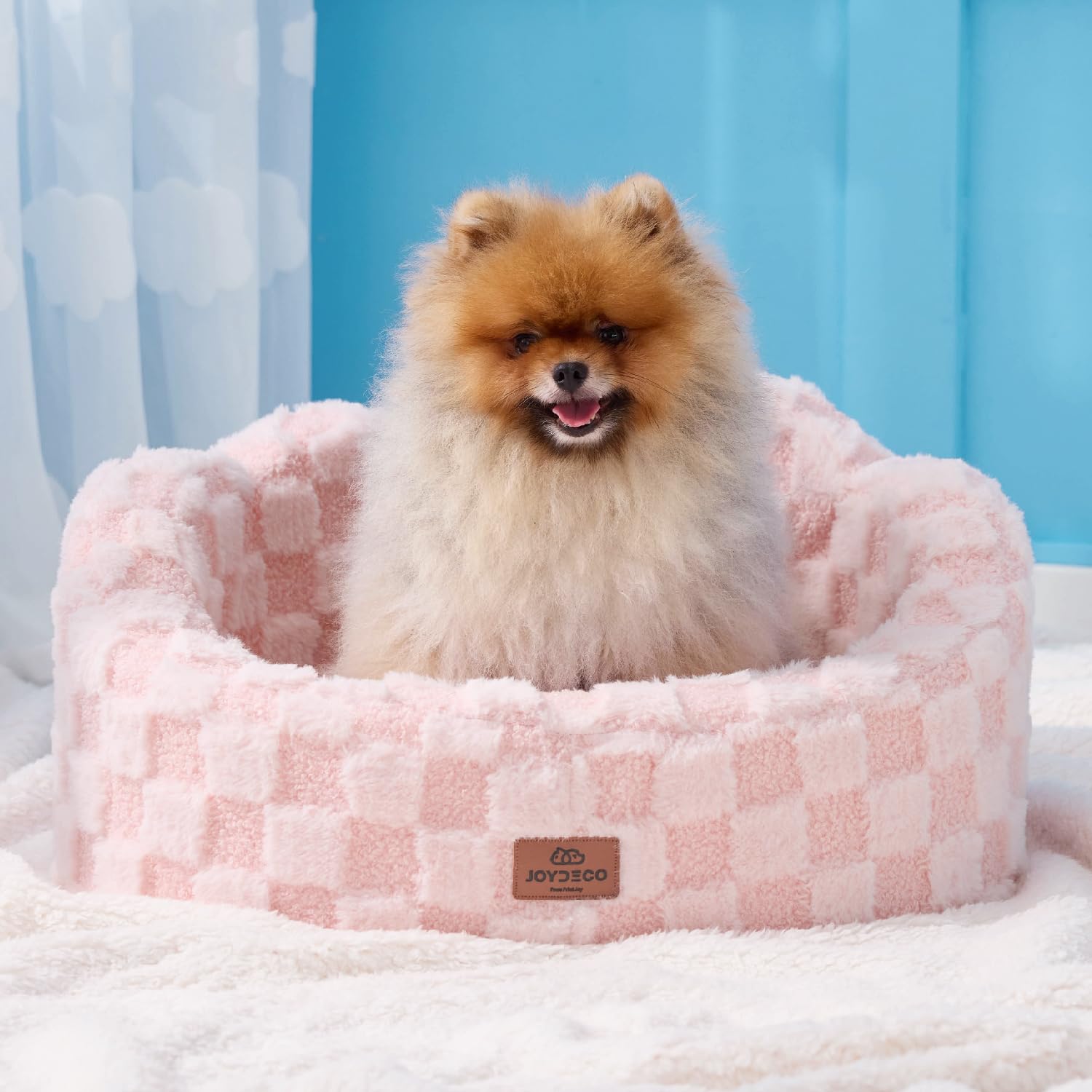 Surface motif carreaux rose Joydeco ajoute style et douceur.