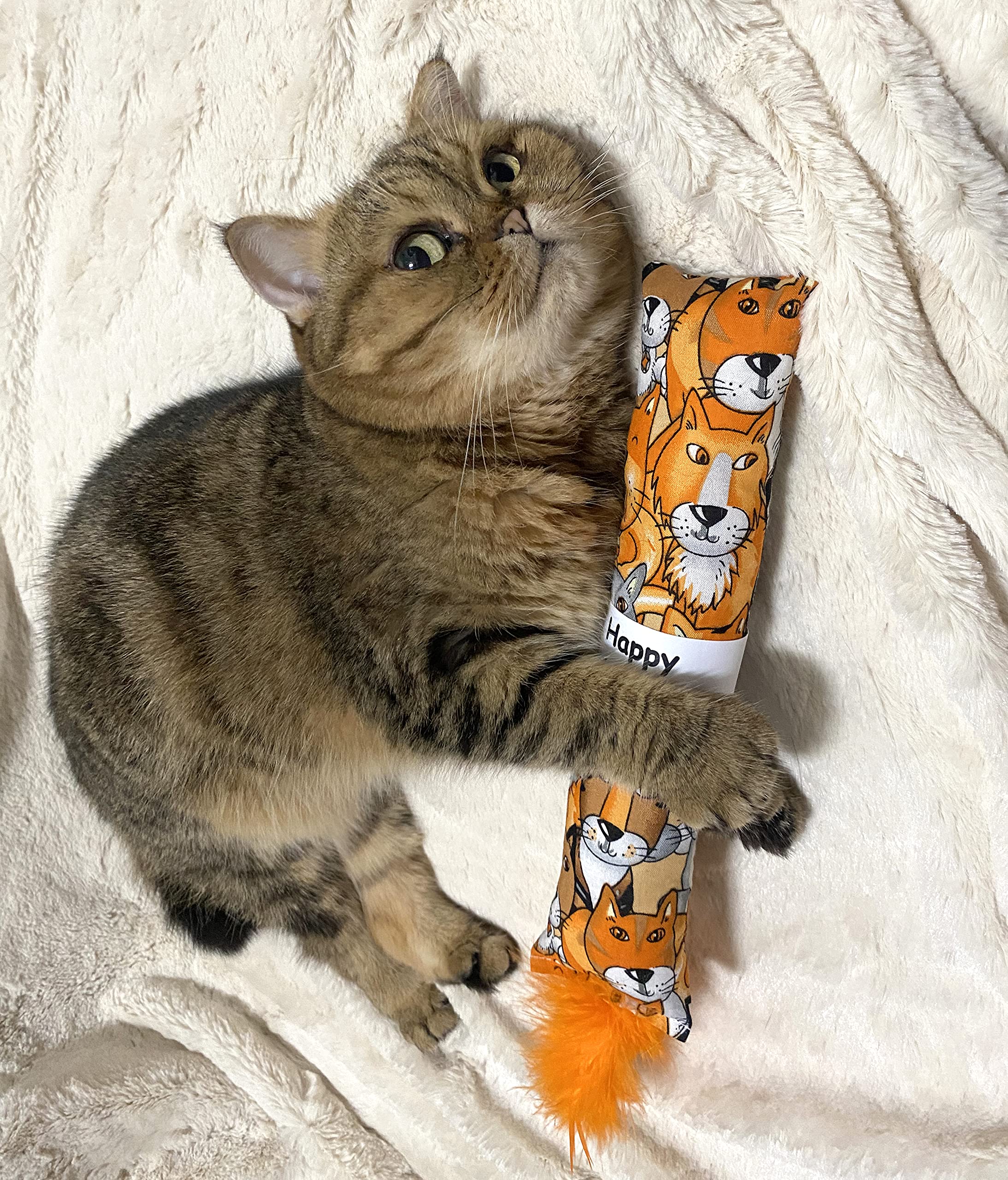 Jouet Jumpaws avec plumes et texture froissée pour stimulation sensorielle
