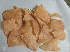 Just Jerky Treats, tranches de poulet séchées en gros plan, goût apprécié par les chiens