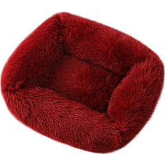 Lit donut La La Pet rouge offrant un cocon douillet pour chats et petits chiens.