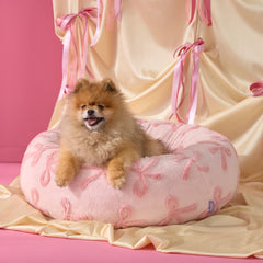 Lit donut Le SURE pour petit chien, rose taaffy, confort et soutien moelleux.