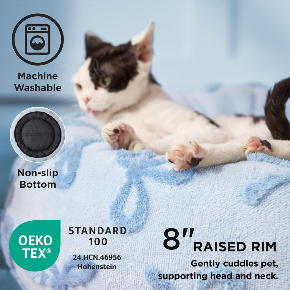 LE SURE lit-donut-ronde-revetement-peluche: chaleur et douceur pour l'animal.