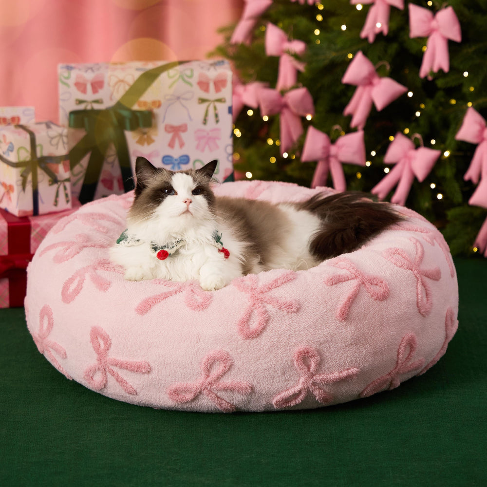 LE SURE nid rond peluche rose, base anti-dérapante pour stabilité au sol.