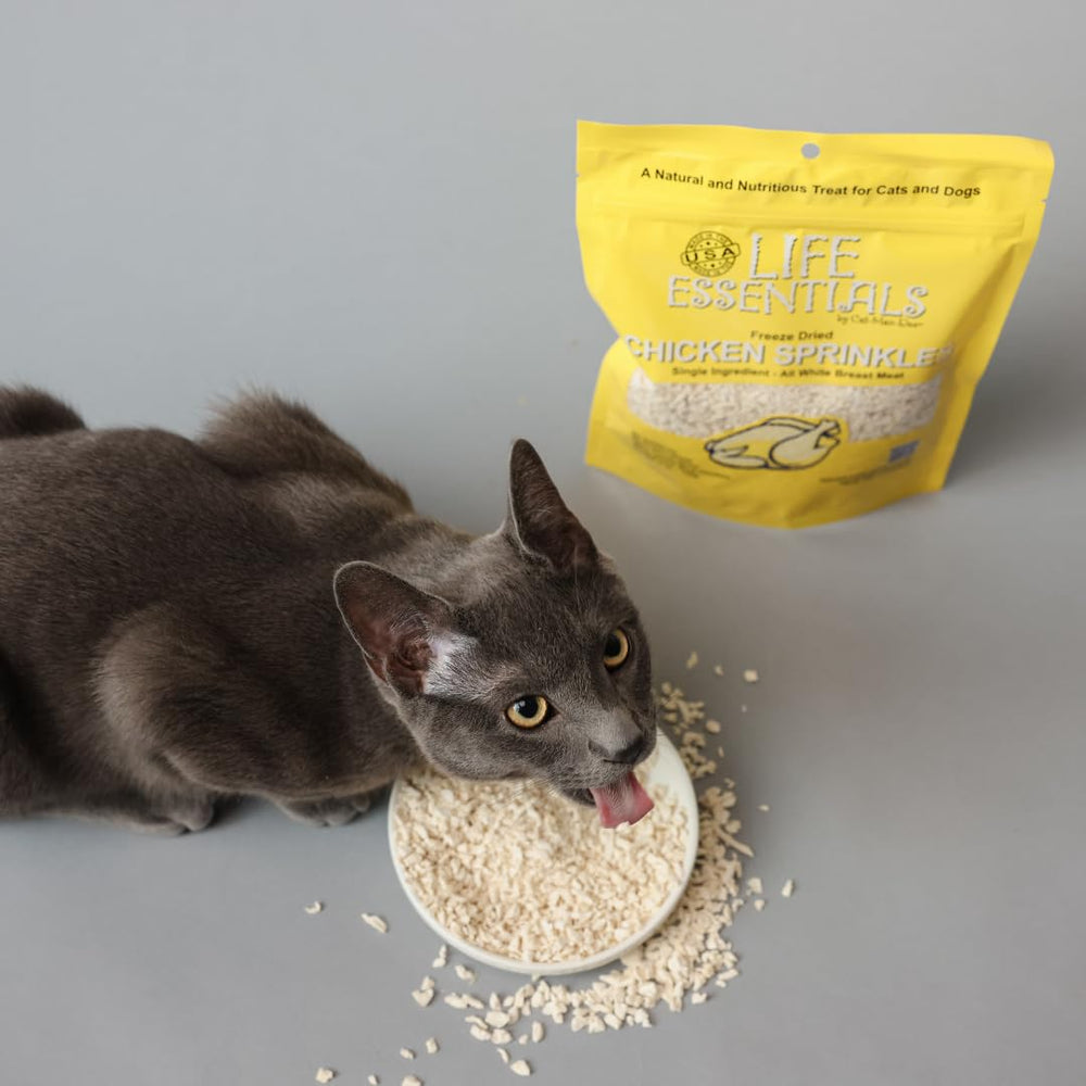 Life Essentials Cat-Man-Doo : petits morceaux de poulet lyophilisé, parfaits pour l'entraînement.