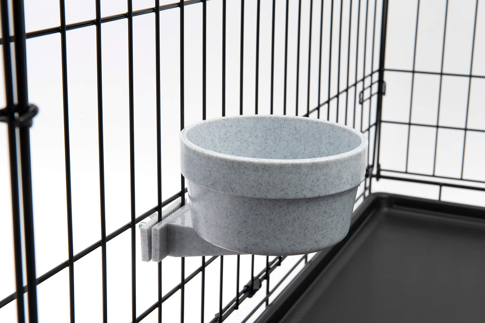 Bol Lixit eau sur cage amovible, pratique et anti-renversement pour les repas.