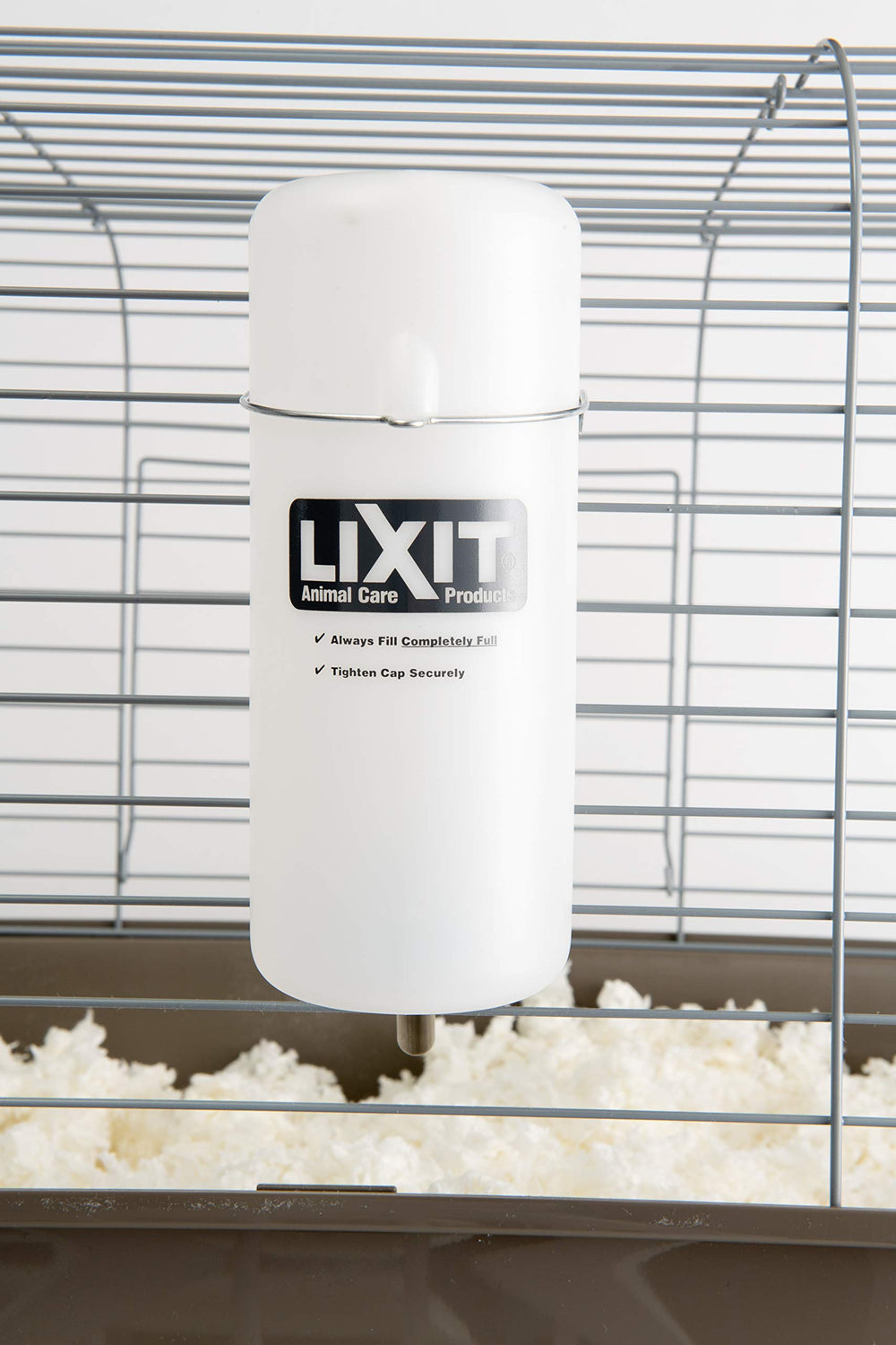 Bouteille Lixit translucide adaptée petits animaux, montage rapide et nettoyage facile