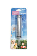 Seringue d’alimentation Lixit de 35 ml en main, pratique pour nourrir les jeunes animaux.
