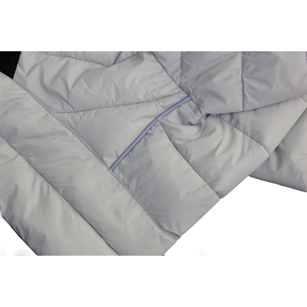 Visibilité améliorée avec bandes réfléchissantes sur le manteau chien 4 pattes nocturne