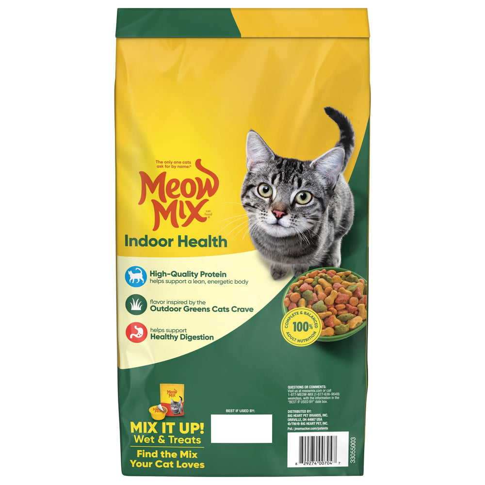 Meow Mix Indoor Health-chat-table, chat savourant un repas en intérieur.