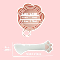 Cuillère patte Meow&Woof pour boîtes, facilite l’extraction et évite le gaspillage.