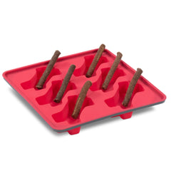 Moule Messy Mutts en silicone encadré pour friandises glacées canines.