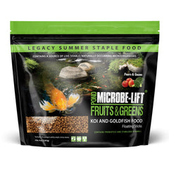 MICROBE-LIFT Fruits et Greens sticks flottants dans l'eau pour une alimentation variée.