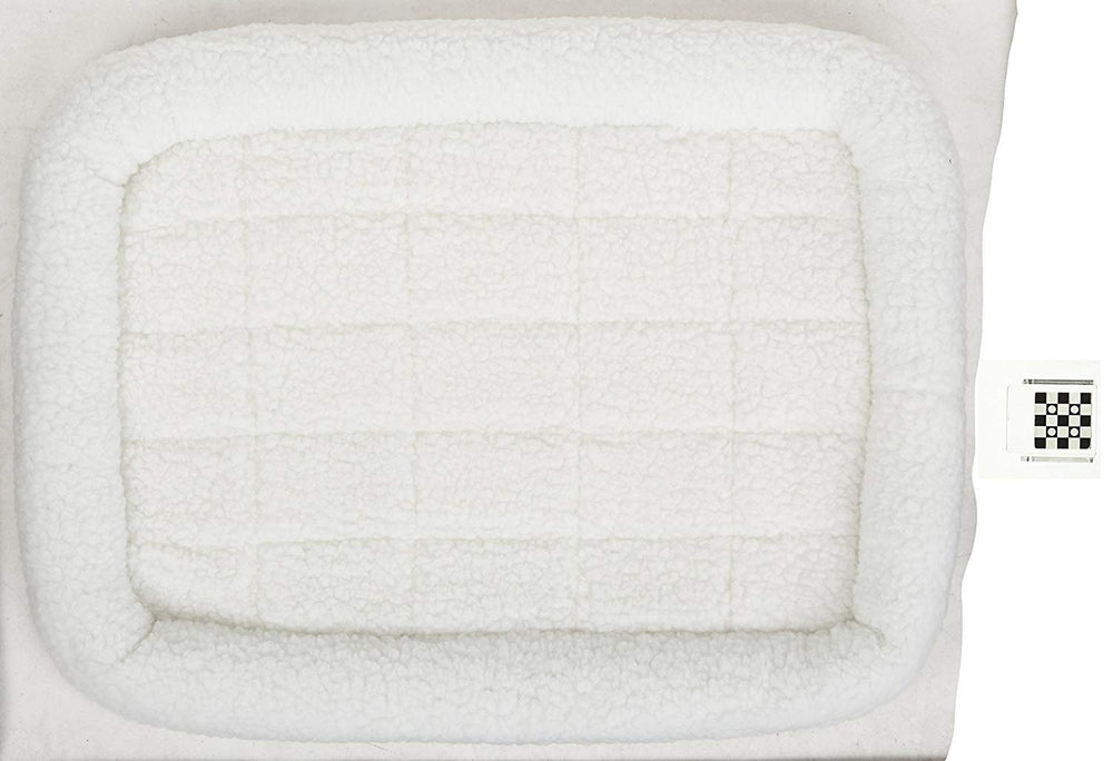 Coussin blanc QuietTime, discrétion et masquage des poils dans la pièce.