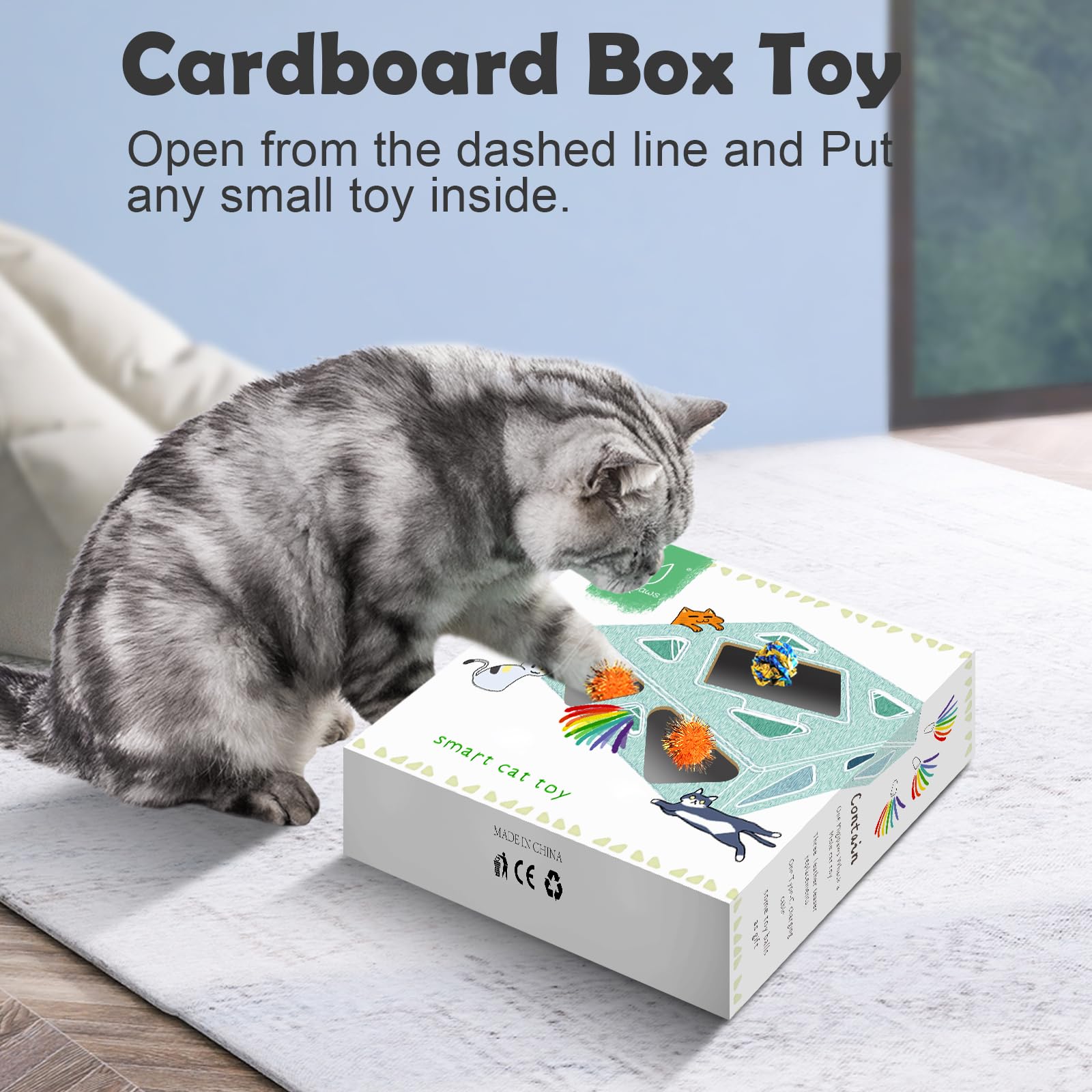 Migipaws Jouet carton : dispositif en carton avec trous et balles.