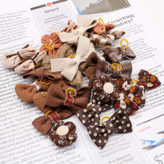 Noeud-cheveux-petit-chien-marron-04 de Mruq Pet, parfaite tenue pour yorkshire.