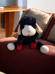 Construction durable Multipet Lamb Chop noir, résistante aux jeux actifs et tirages.
