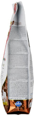 Texture croquante des croquettes pour chien adulte.