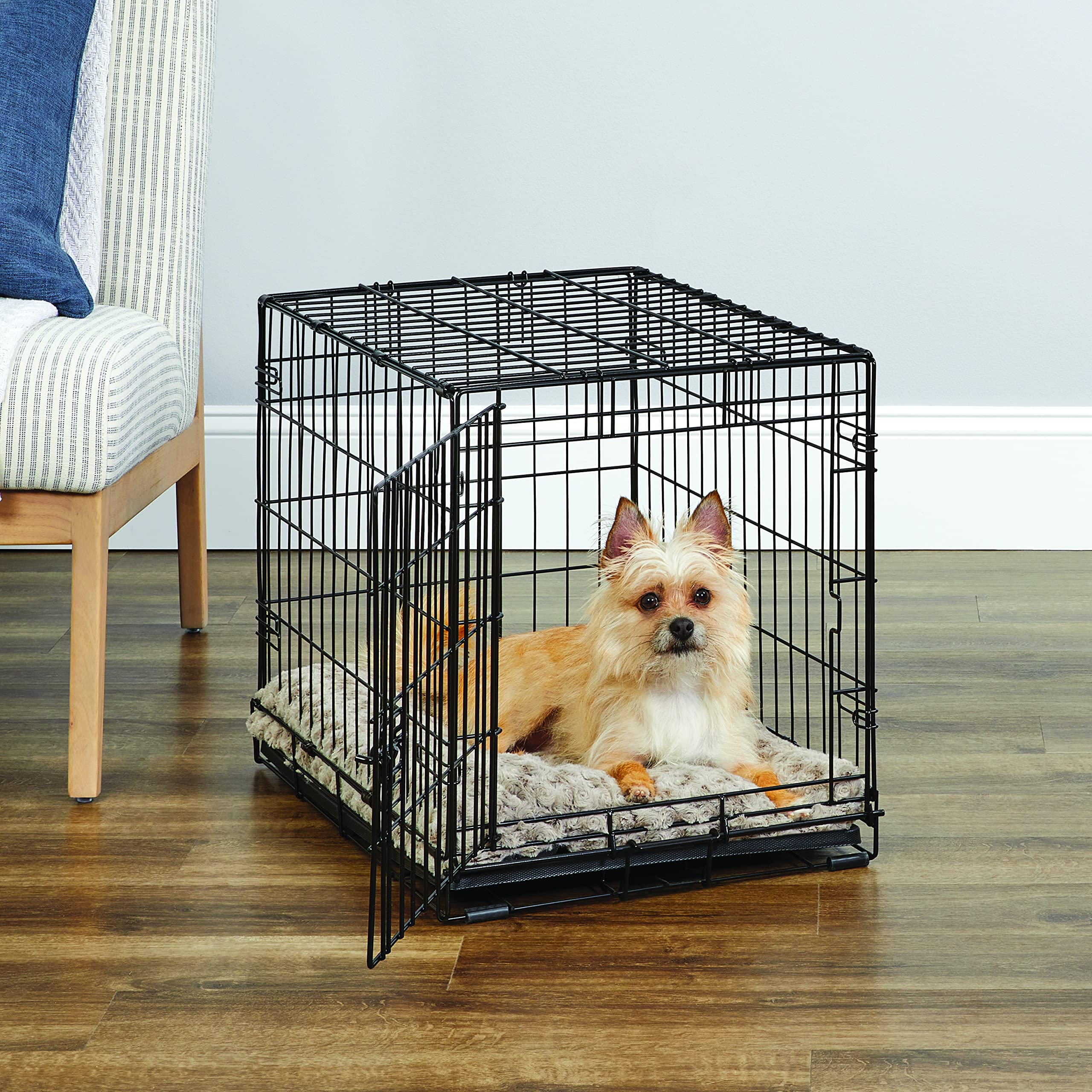 New World cage, verrou coulissant et bloc-pattes pour plus de sécurité en voyage.