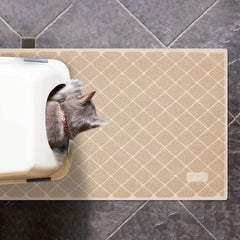 Tapis Niubya avec rainures profondes capturant les granules.