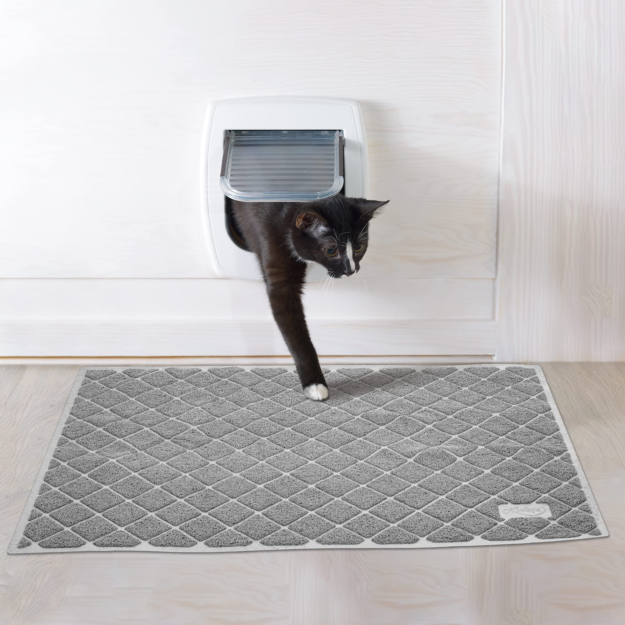 Niubya tapis litiere seche rapidement, pret a reutiliser.