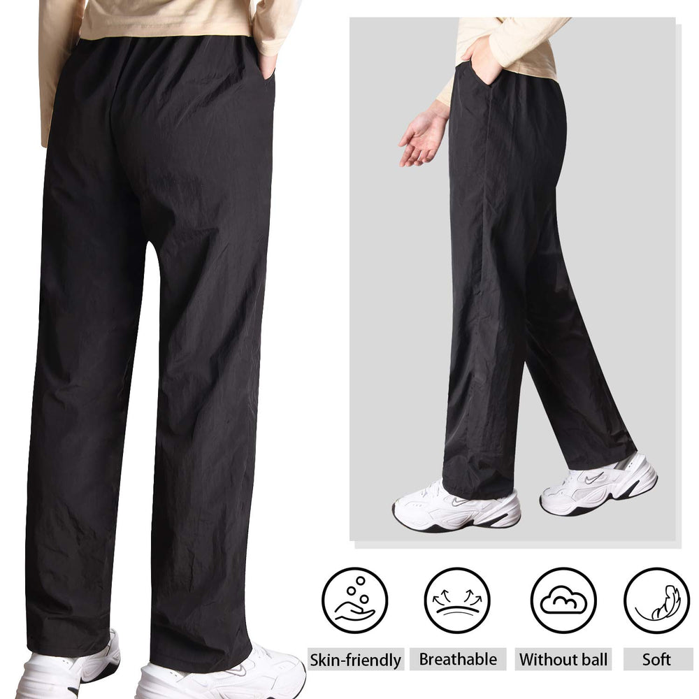 Pantalon Noverlife Toilettage Professionnel noir anti-éclaboussures, garde vos vêtements propres.
