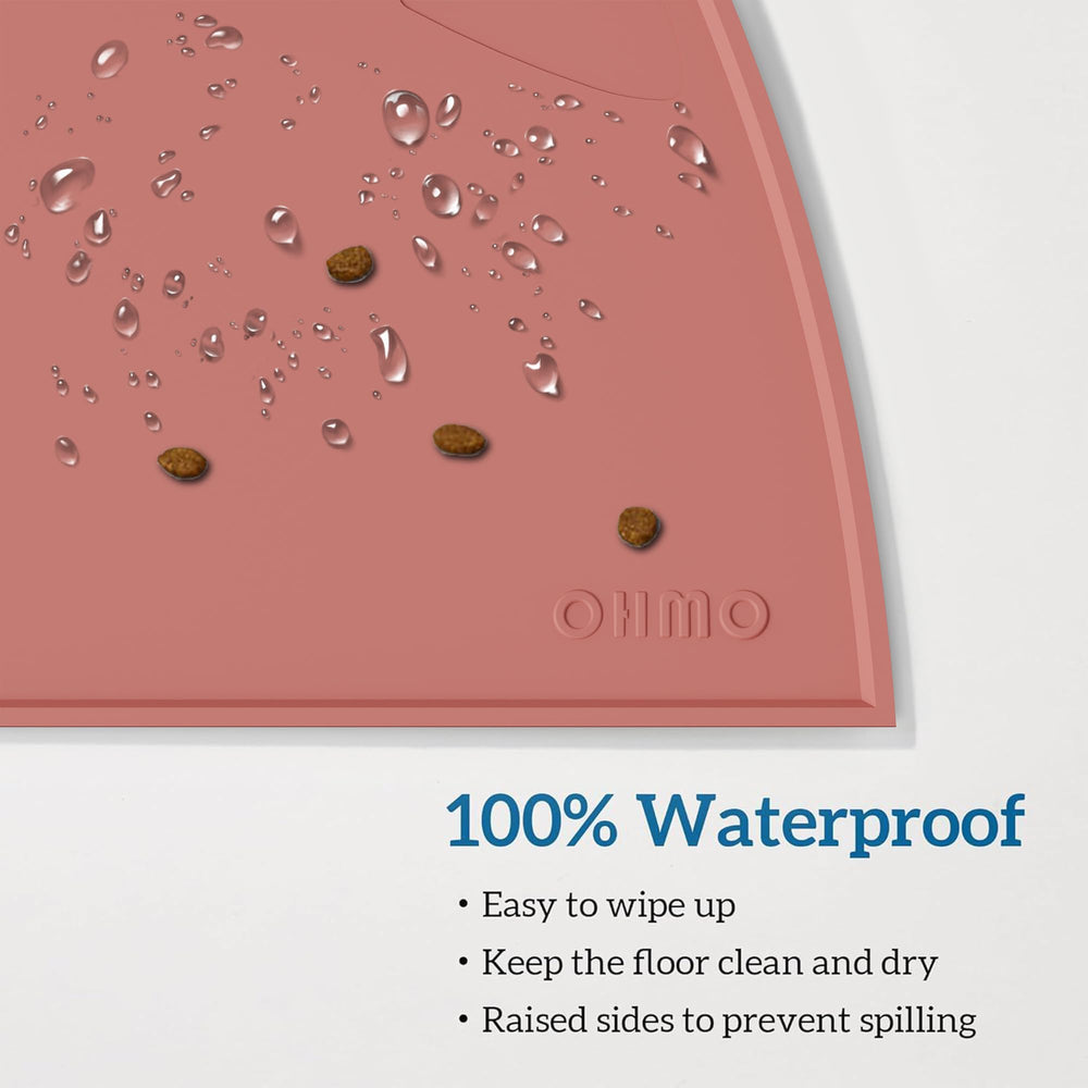 OHMO tapis alimentation rebord haut, contenu retenu et sol protege.