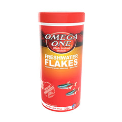 Omega One Flocons d’eau douce dans un bocal, nourrissement régulier pour poissons.