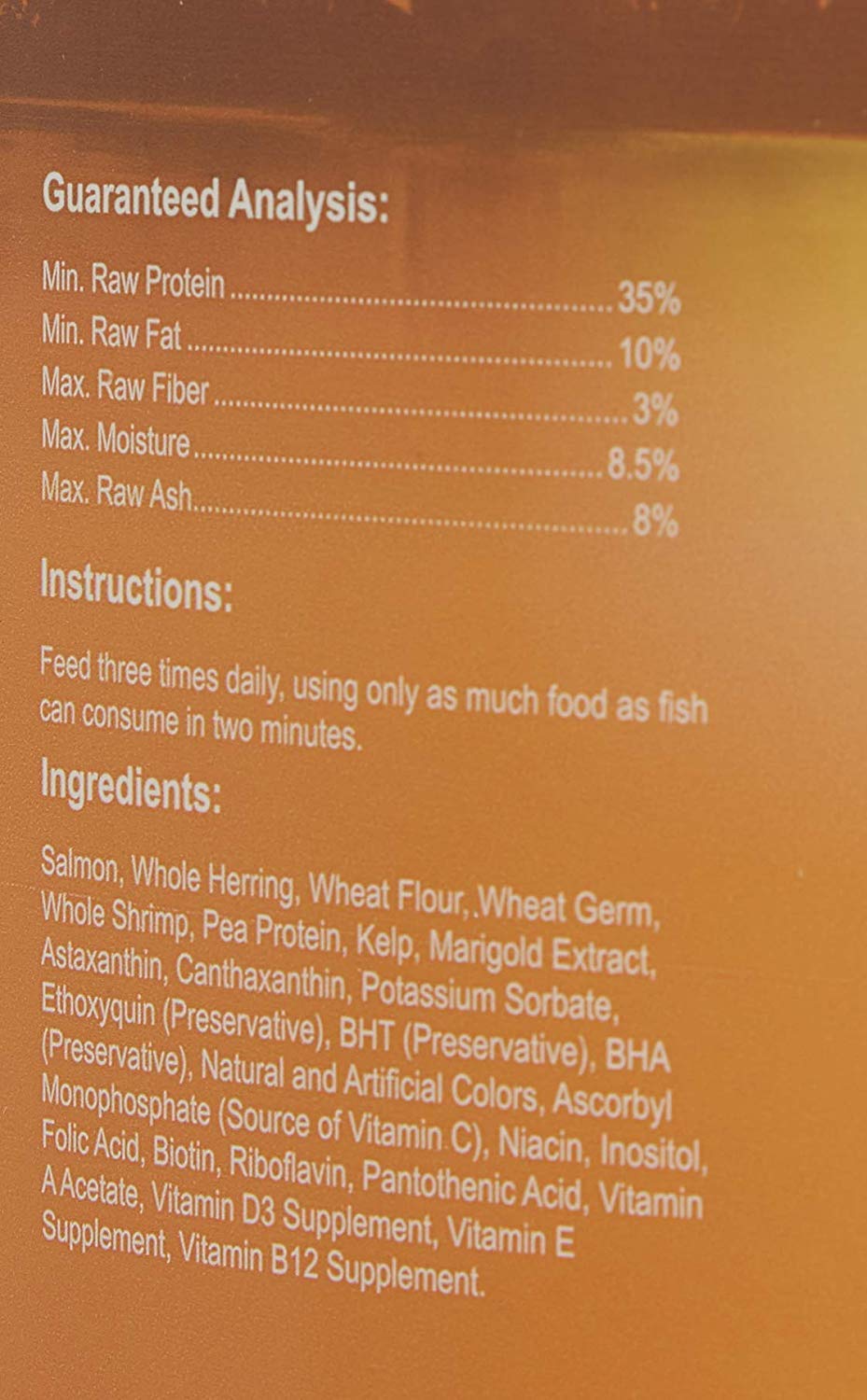 Omega One granulés coulants pour poisson rouge, doseur intégré facilitant l'alimentation.