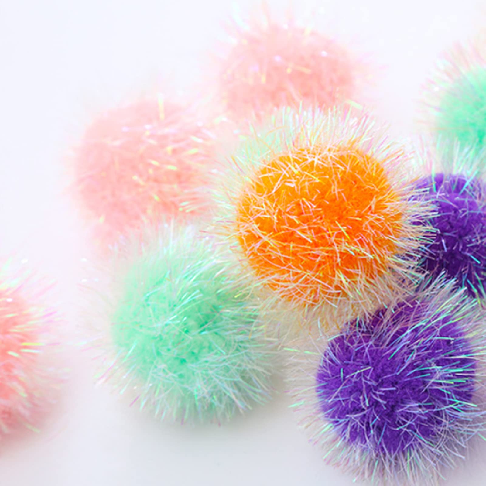 Osvela balle pompon brillant avec paillettes scintillantes pour des sessions de jeu visuelles.