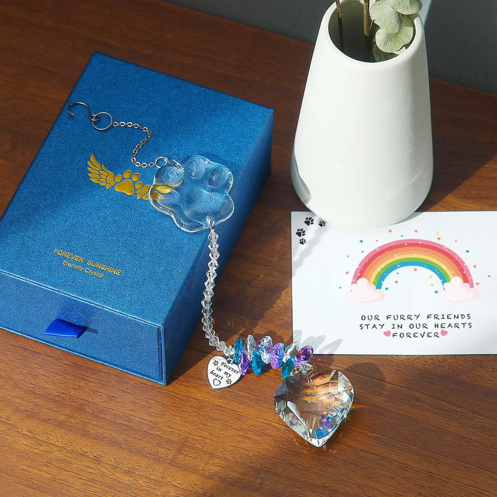 Attrape-soleil Paws Memory: cœur cristal en base, symbole d'affection durable
