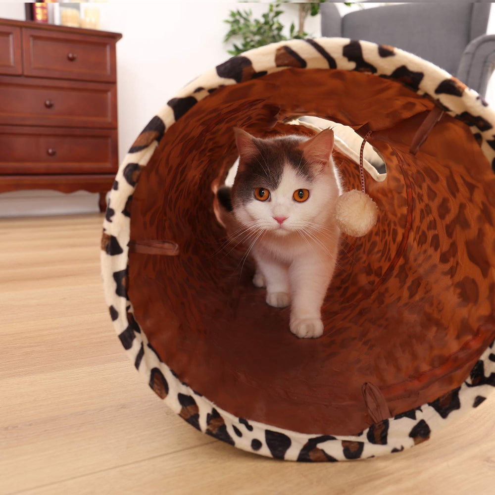 PAWZ Road tunnel pliable, disque compact pour rangement facile.