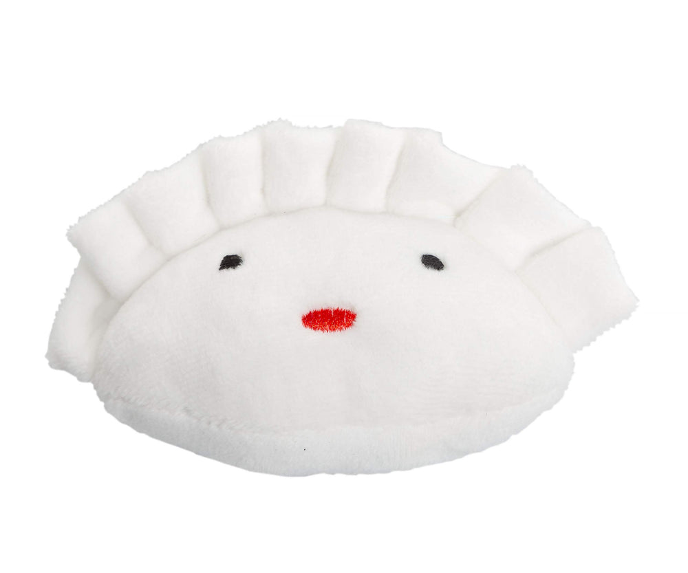 Texture veloutée et douceur d’une peluche Dim Sum Pearhead pour chiot et chien adulte.