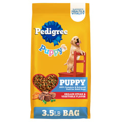 Pedigree croquettes chiot steak grille et légumes, soutenant le développement musculaire et une alimentation équilibrée.