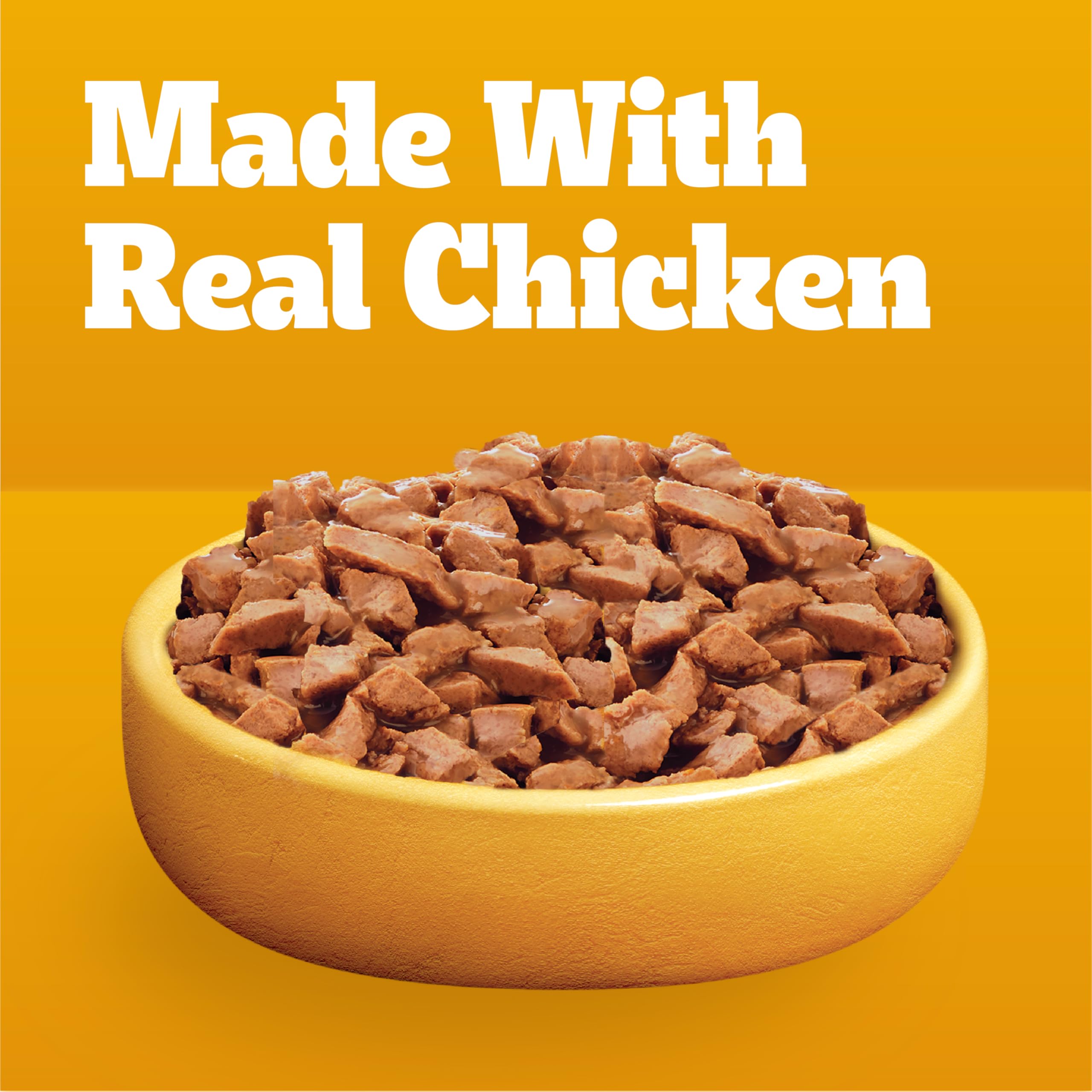 Chiot heureux dégustant Pedigree Morsels en sauce