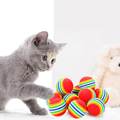 Balle PET SHOW rouge arc-en-ciel, légère et idéale pour les jeux d'intérieur.