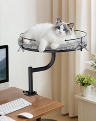 Lit de bureau Petcozife pour chat en rotation 360°, proximité pendant le travail.