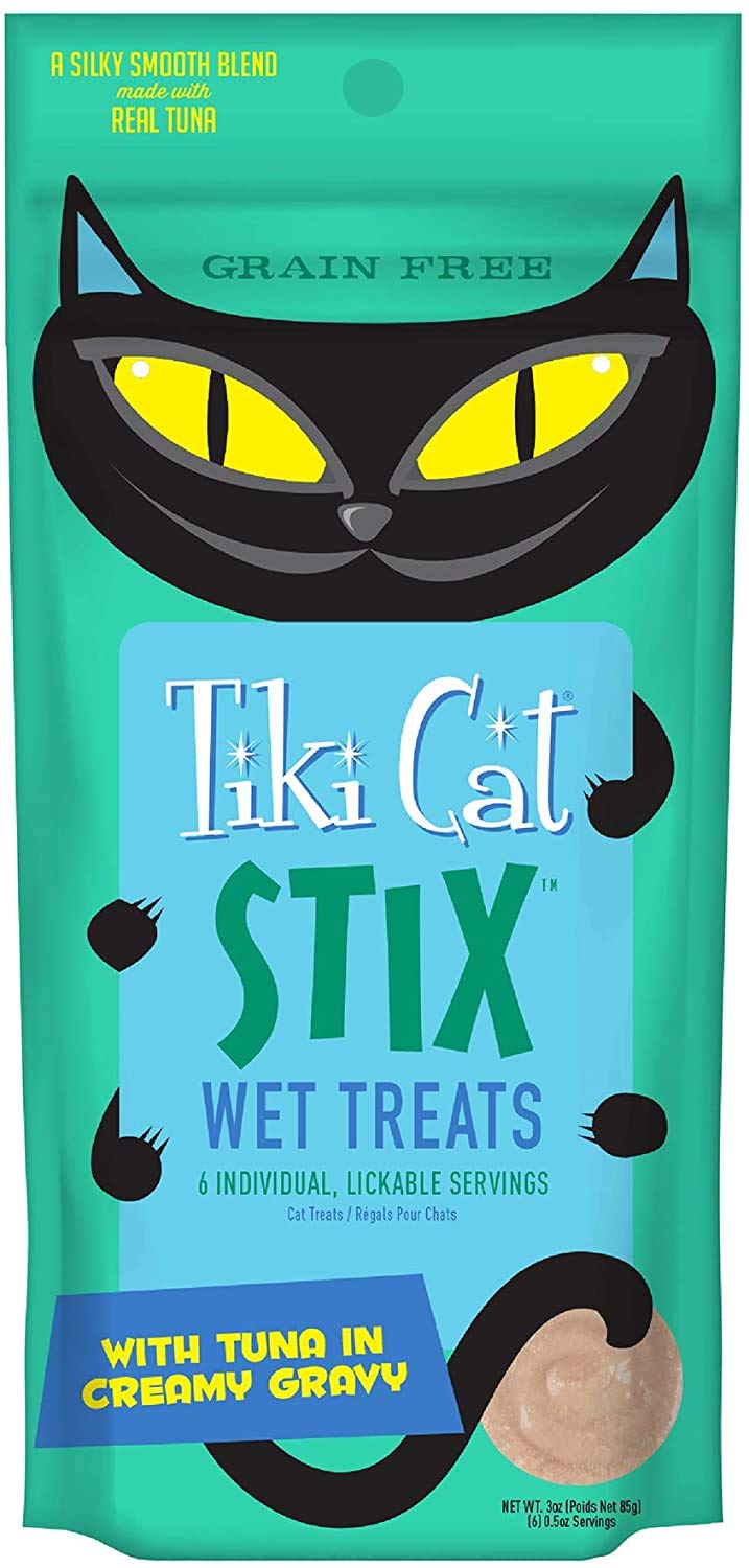 Pet Faves Tiki Cat Stix poulet-mousse-tube, texture crémeuse appréciée par les chats.