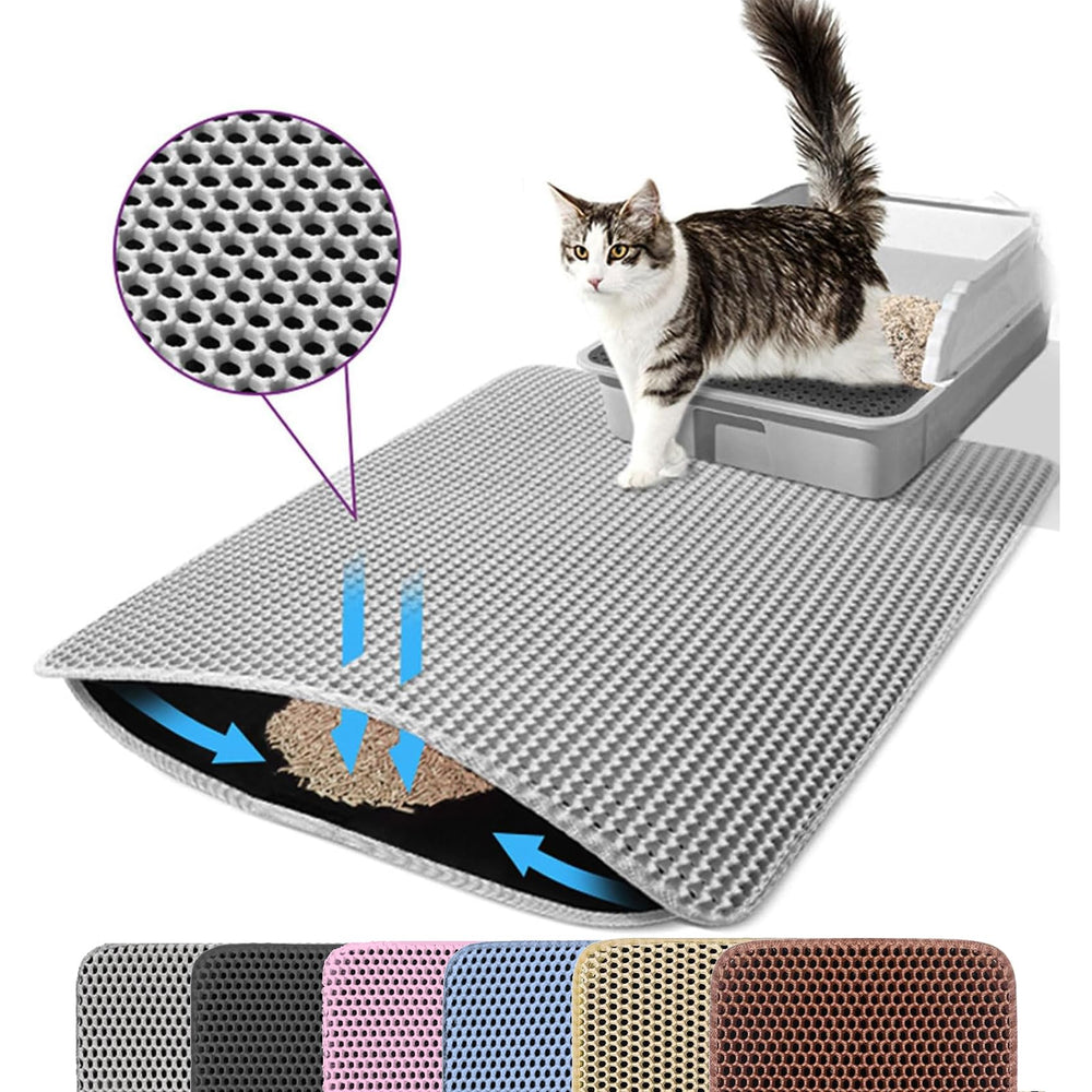 Tapis Petinstinct gris extralarge devant la litière, capture les grains pour sol propre.