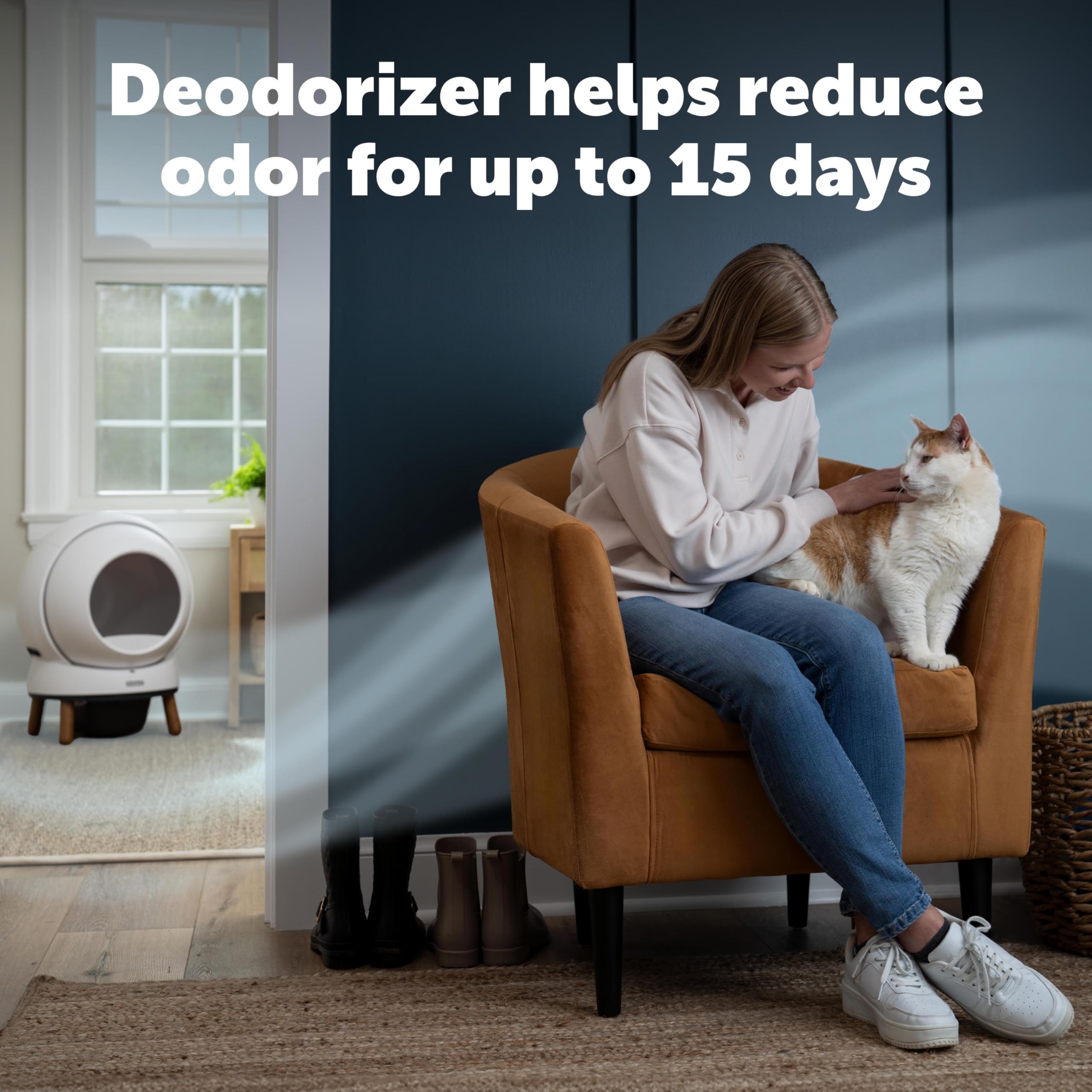 Désodorisant PetSafe ScoopFree SmartSpin insertion facile dans le compartiment avant.