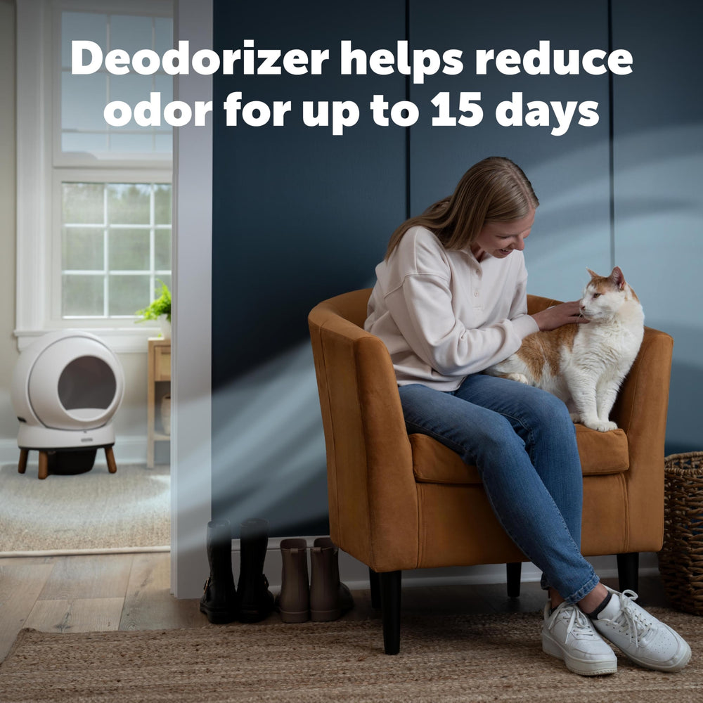 Désodorisant PetSafe ScoopFree SmartSpin insertion facile dans le compartiment avant.