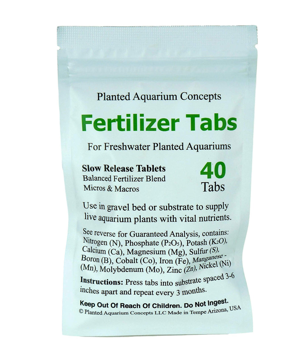 Tablettes d'engrais Planted Aquarium Concepts dans le substrat favorisant l'enracinement.