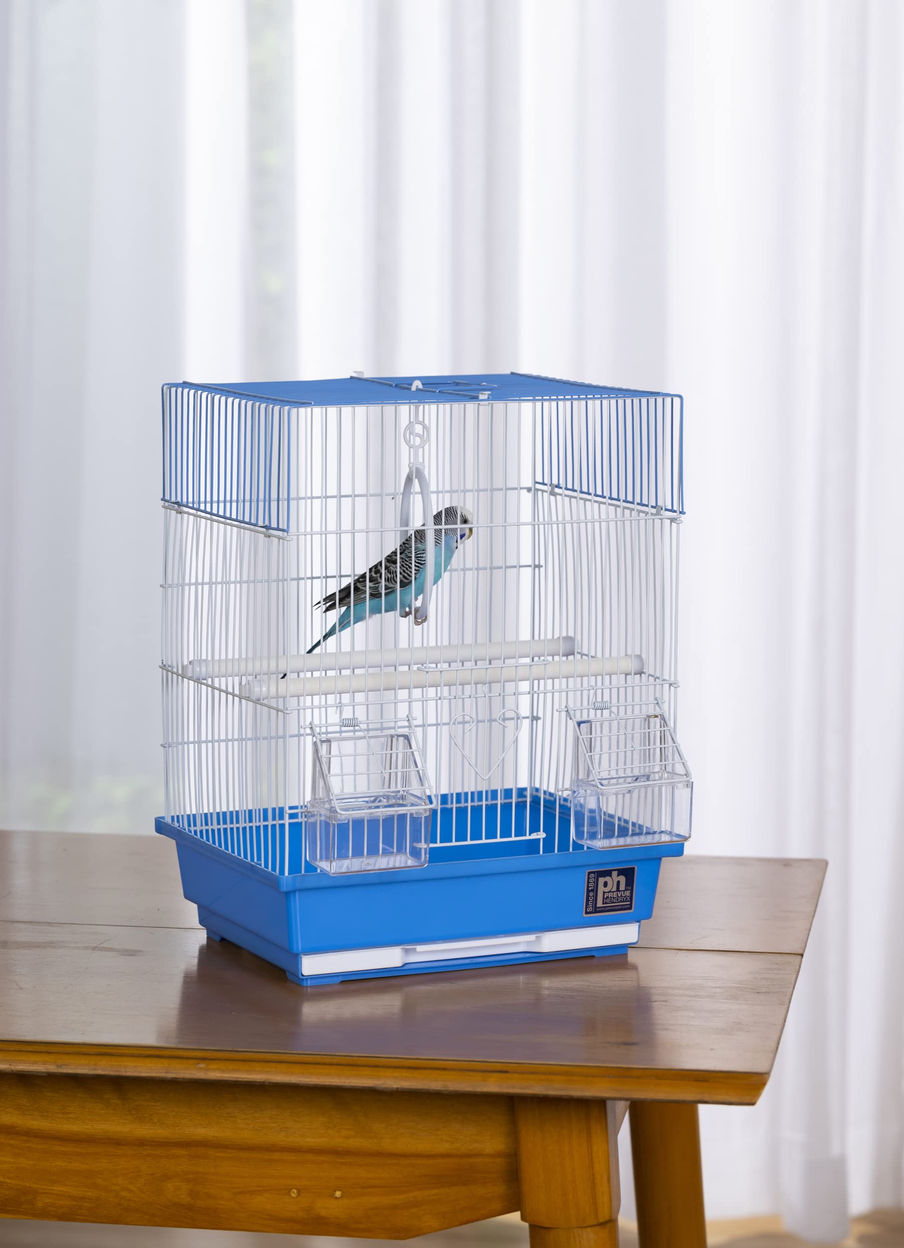 Cage d oiseau mini Prevue Hendryx avec accessoires inclus bleu et blanc.
