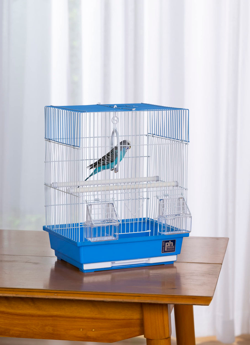 Cage d oiseau mini Prevue Hendryx avec accessoires inclus bleu et blanc.