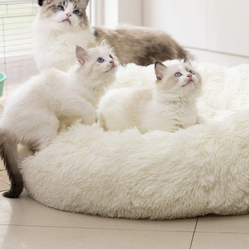 Lit rond blanc Raimaiso, surface moelleuse pour repos apaisé.
