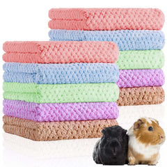 Reginary couverture rose clair pour cage, douceur et absorption efficace.
